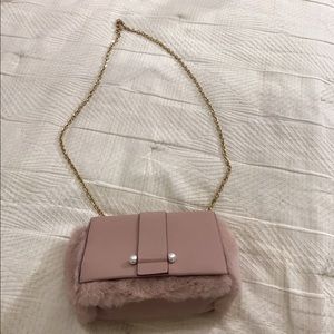 Mauve faux fur purse with pearls